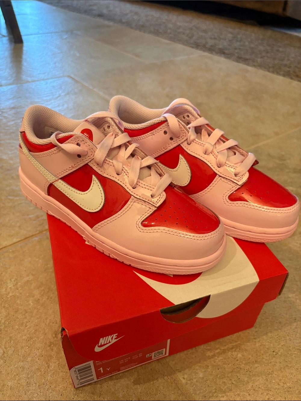 Nike Kids Pink and Red Low-Top Sneakers with White Swoosh